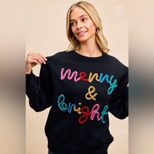 BIBI NWT Sweater Black tinsel Merry & Bright
Size Small - Xlarge